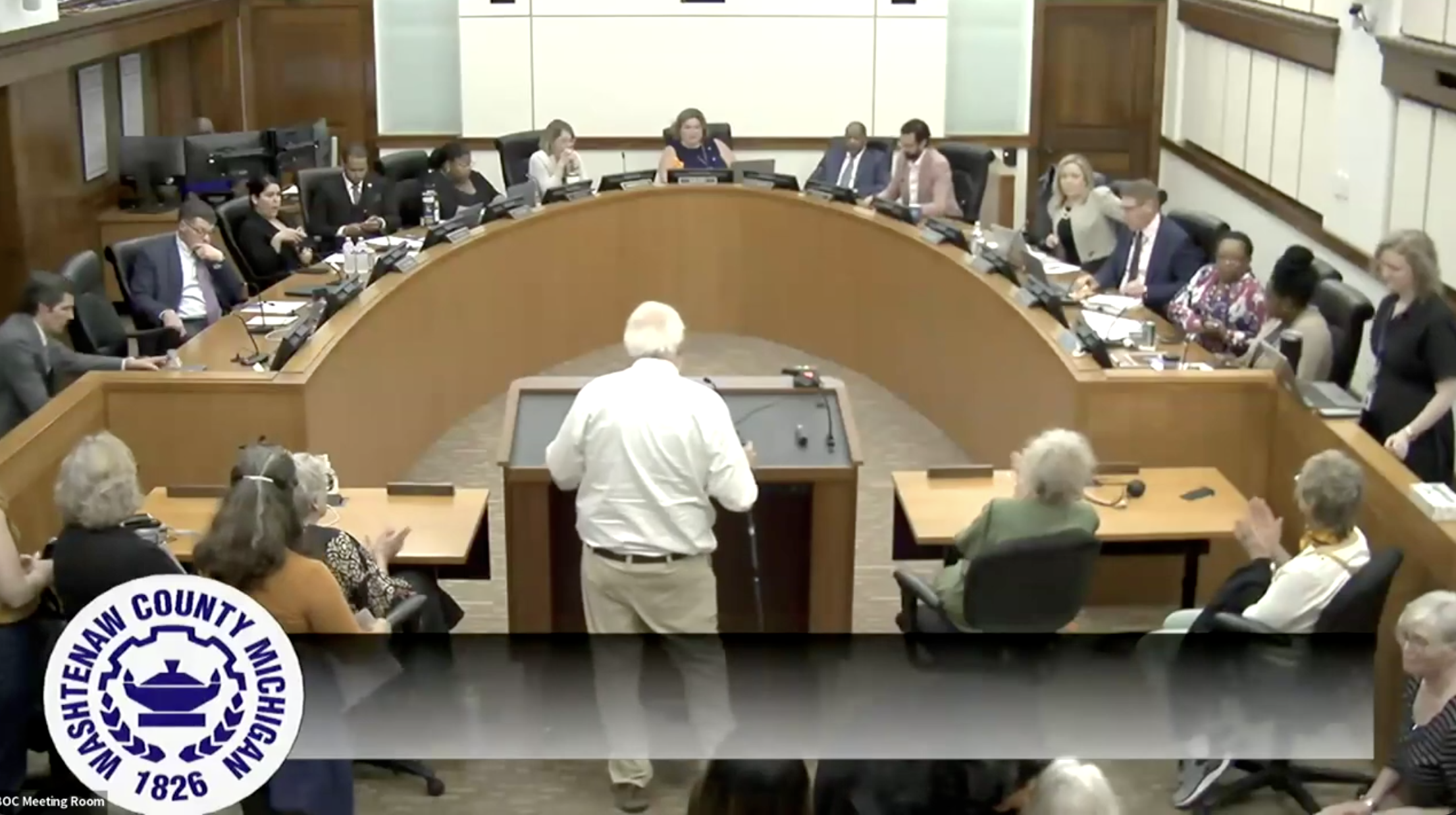 Washtenaw County Commissioners seated at desks during board meeting on DHS subpoena response, May 2025